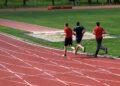 People running on a track.